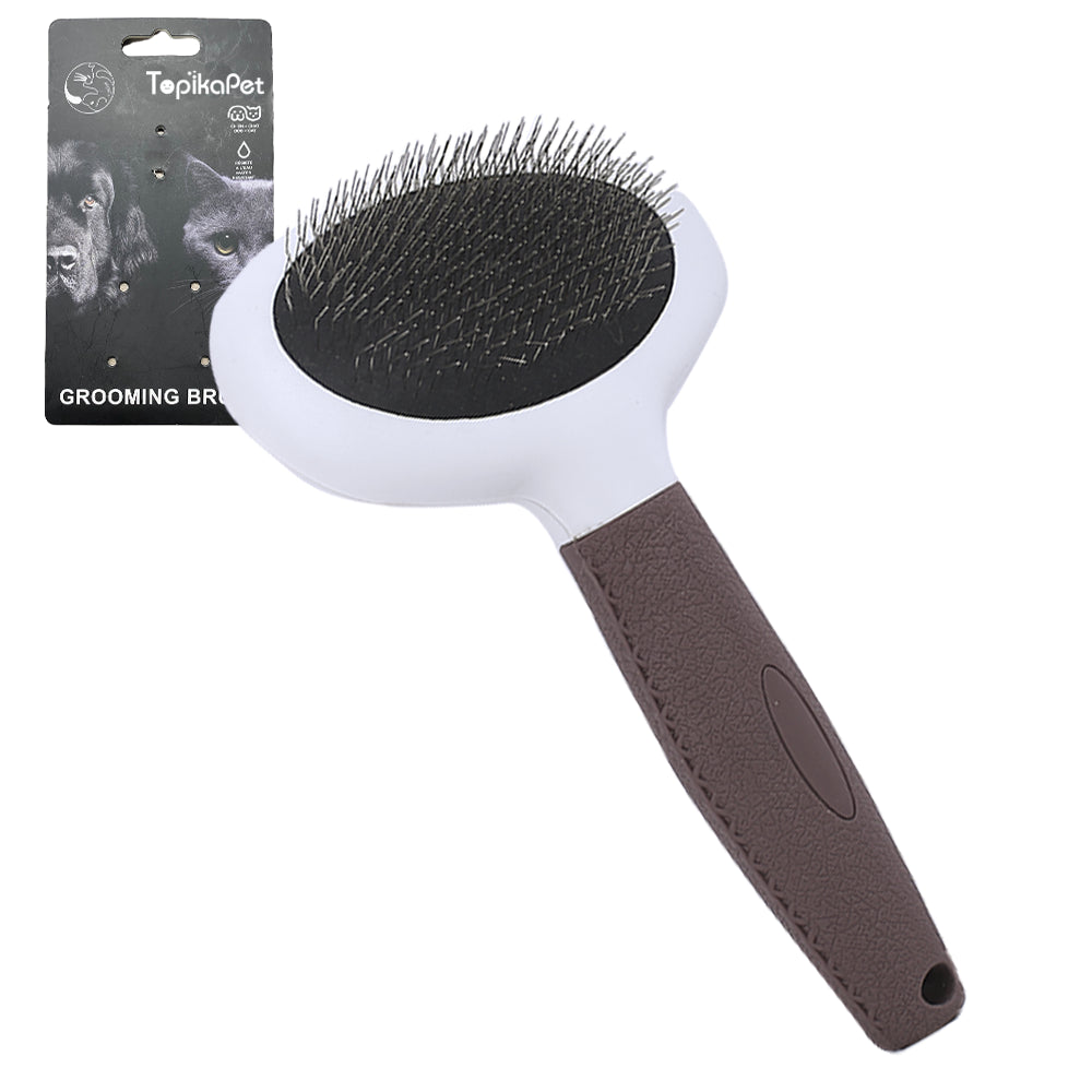 Pet grooming brush with brown handle and black bristles on a white background